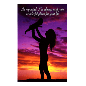 A woman holding her child in the air.