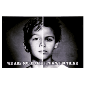 A young boy is half white and half black.