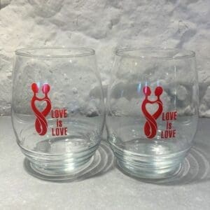 Two glasses with a red lobster on them