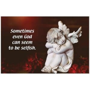 A statue of an angel with a quote on it.