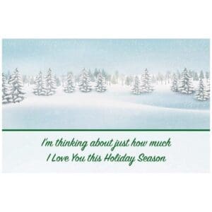A card with trees and snow in the background.