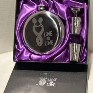A gift set with a flask and wine bottle.